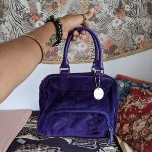 purple corduroy bag